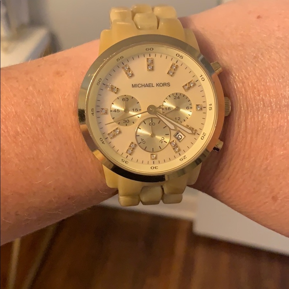 Two tone gold bracelet watch. Michael Kors.